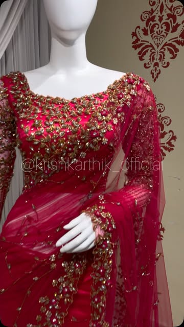 This stunning deep pink saree features intricate gold embroi