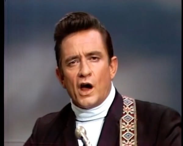 Johnny Cash Performing Ring of fire with Carl Perkins, Marsh