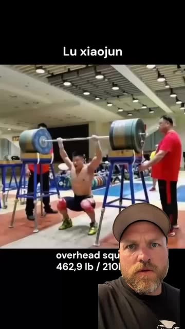 Lu Xiaojun hitting a 462 lb overhead squat is straight-up mi