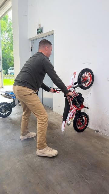 Gift the joy of riding with a Red 49CC Mini Mountain Bike Sc