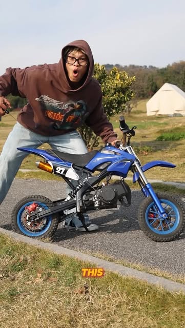 Unleash the fun with this 49cc manual start mini dirt bike!