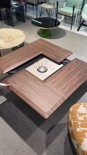 A coffee table with a transforming mechanism.
A unique desi