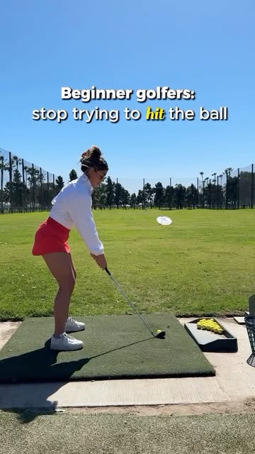 Most beginner golfers try to hit the ball before they learn