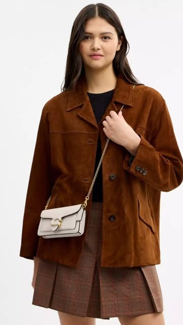 Coach tabby wrislet
.
.
Detail
.
Polished pebble leather
T